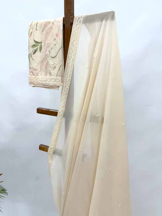 IVORY GEORGETTE SAREE WITH PEARL EMBELLISHMENT AND FLORAL BLOUSE FABRIC