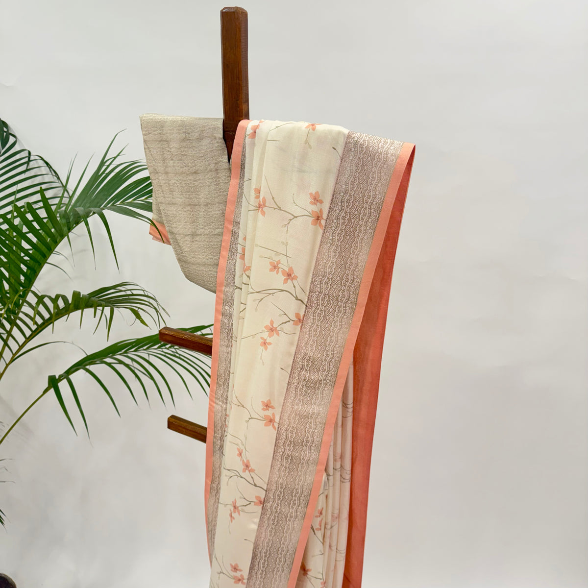 IVORY BLOOM SOFT SILK SAREE WITH PEACH SILK BORDER