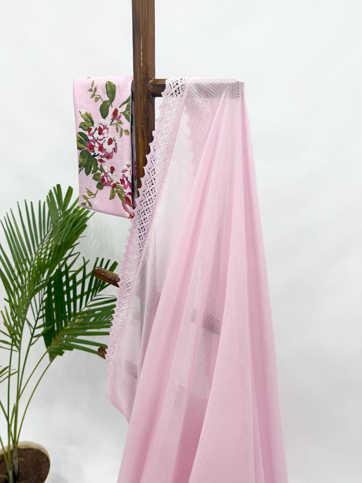 LIGHT PINK KOTA SAREE WITH PINK FLOWER BUNCH BLOUSE FABRIC