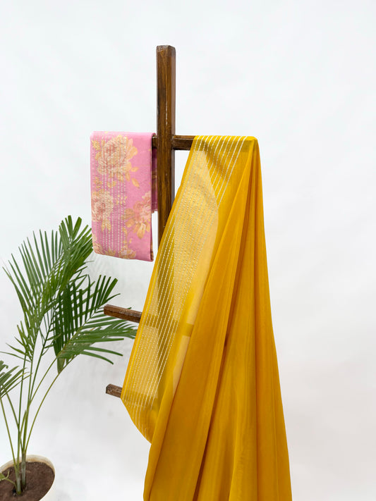 YELLOW CREPE SILKS SAREE WITH PINK SINGLE FLOWER BUNCH BLOUSE FABRIC