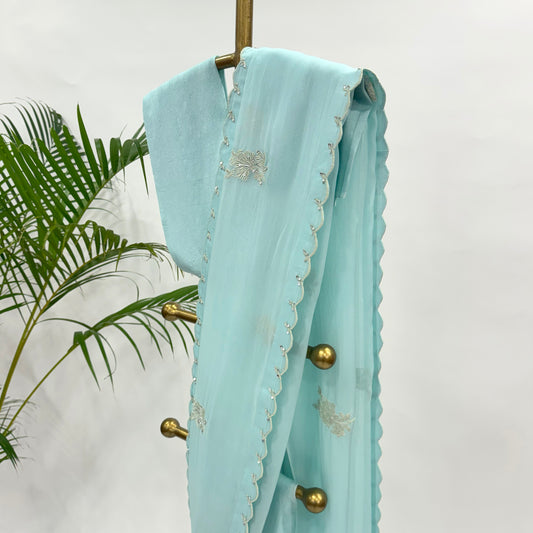 BLUE FALLING ORGANZA SAREE WITH THREAD MOTIFS AND UNSTITCHED BLOUSE FABRIC