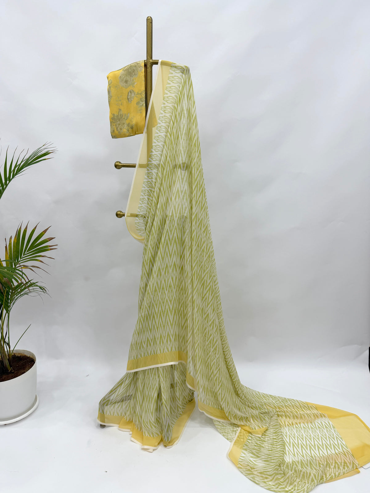 GREEN STRIPES GEORGETTE SAREE WITH YELLOW FLORAL BLOUSE FABRIC