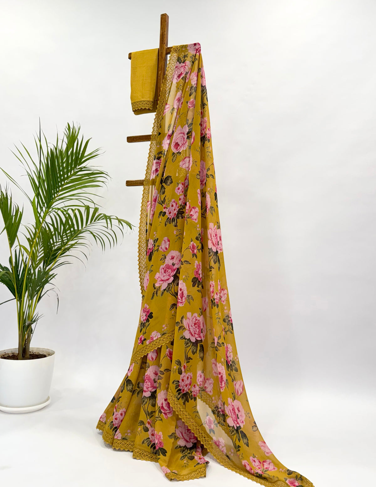 GREENISH YELLOW FLOWER BUNCH GEORGETTE SAREE WITH CROCHET LACE