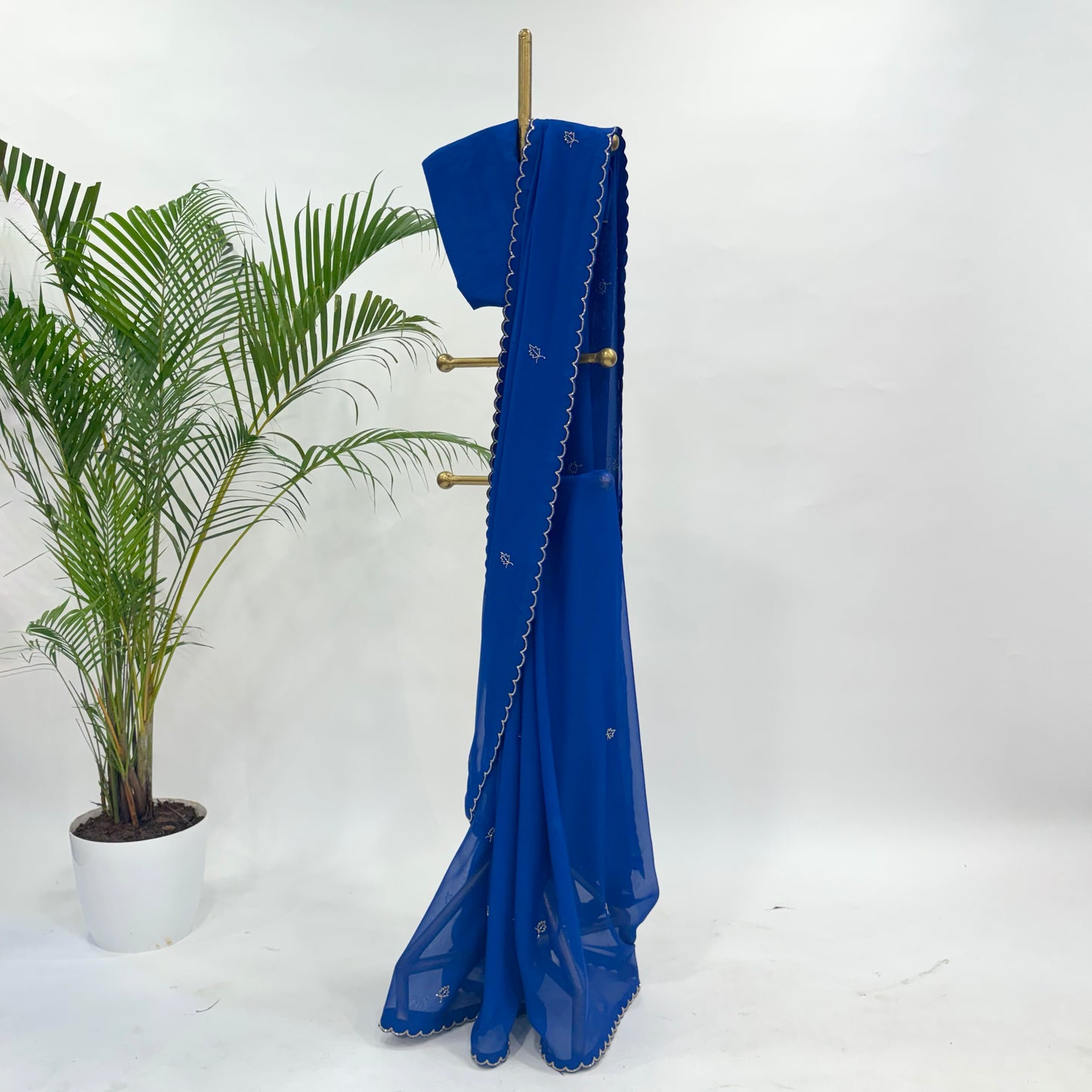 Shocking Blue Leaf Pearl Motifs Falling Organza Saree