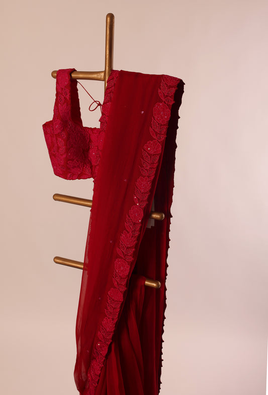 Red Applique and zardosi embellished falling Organza Saree and silk blouse