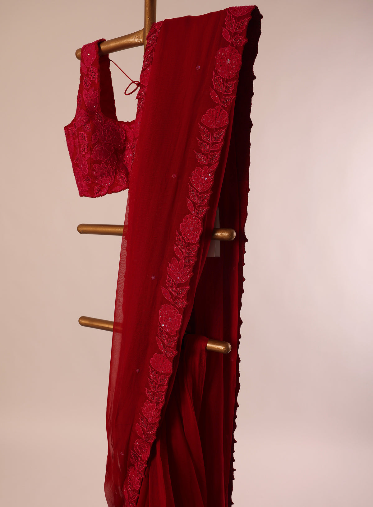 Red Applique and zardosi embellished falling Organza Saree and silk blouse