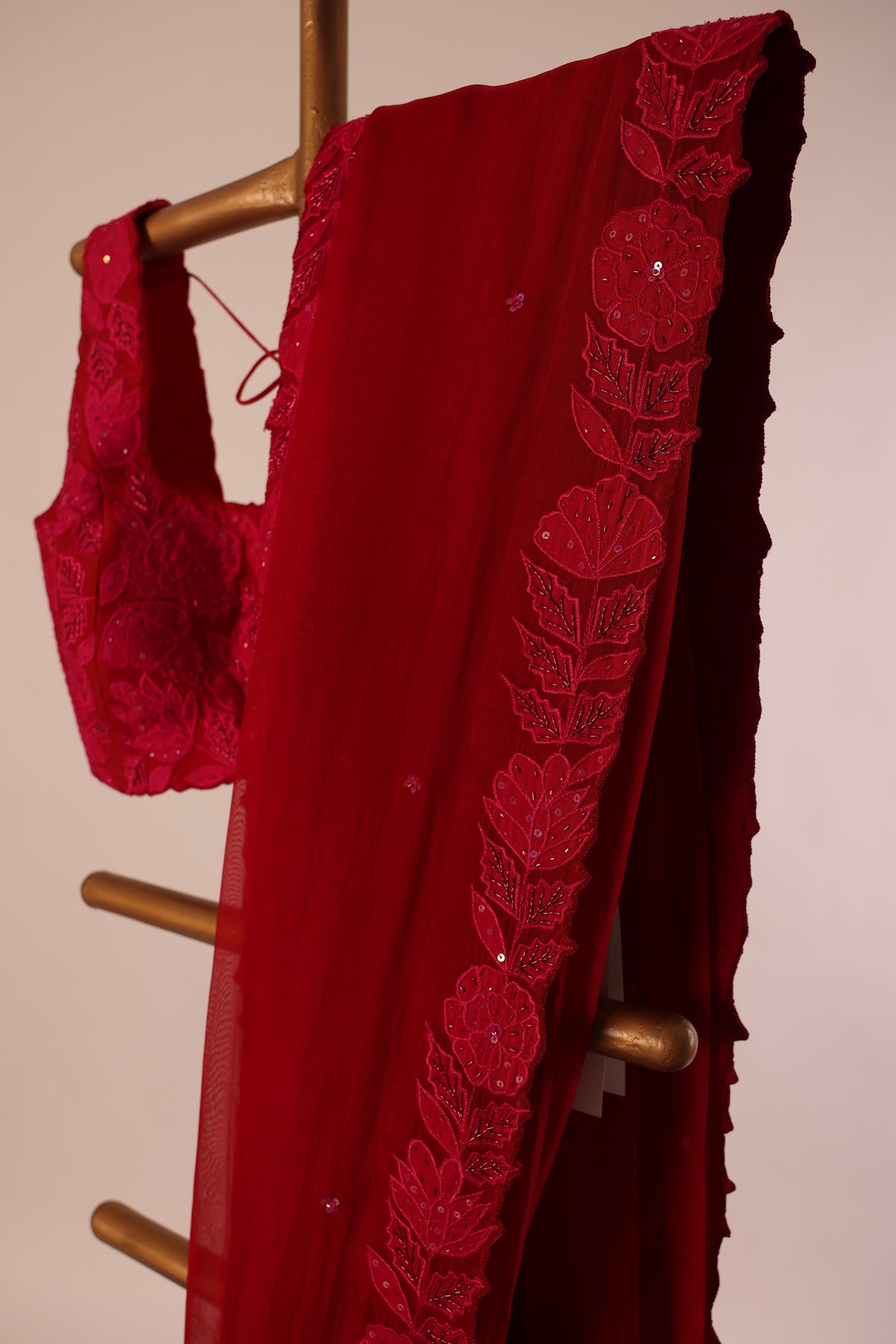 Red Applique and zardosi embellished falling Organza Saree and silk blouse