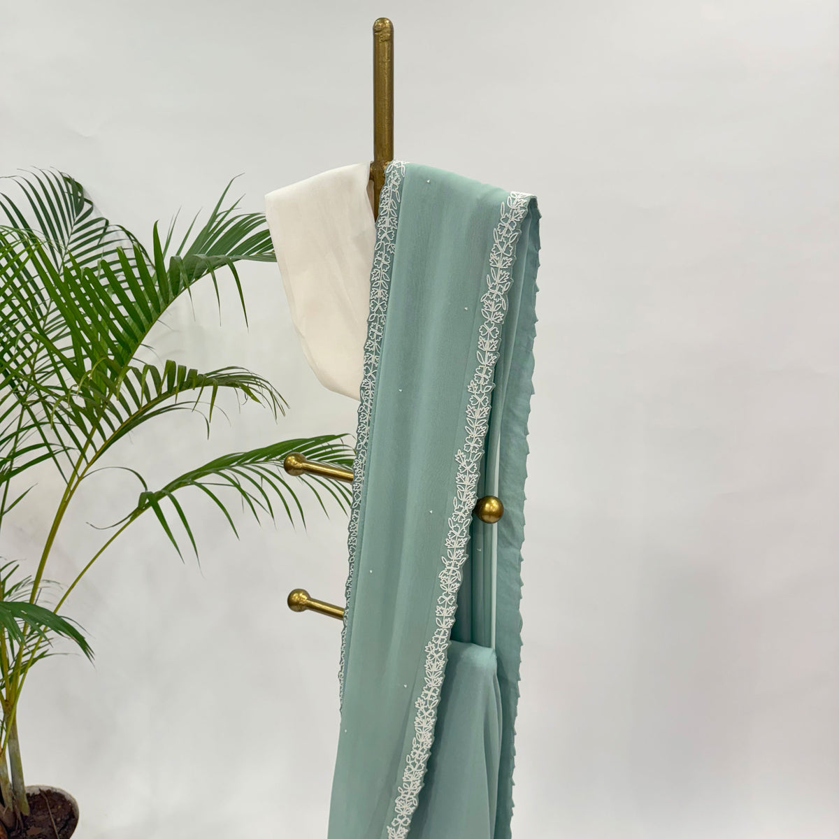 PASTEL BLUE PEARL BORDER GEORGETTE SAREE