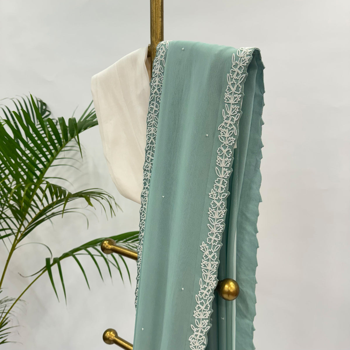 PASTEL BLUE PEARL BORDER GEORGETTE SAREE