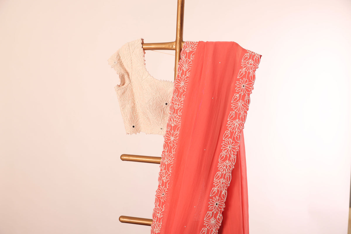 PEACH PEARL BORDER ORGANZA SAREE WITH SMALL PEARL EMBROIDERED BLOUSE