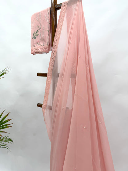 PEACH GEORGETTE SAREE WITH PEARL EMBELLISHMENT AND FLORAL BLOUSE FABRIC