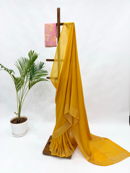 YELLOW CREPE SILKS SAREE WITH PINK SINGLE FLOWER BUNCH BLOUSE FABRIC