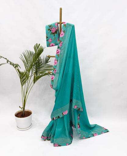 COPPER SULPHATE BLUE CREPE SILKS SAREE WITH FLORAL BLOUSE FABRIC