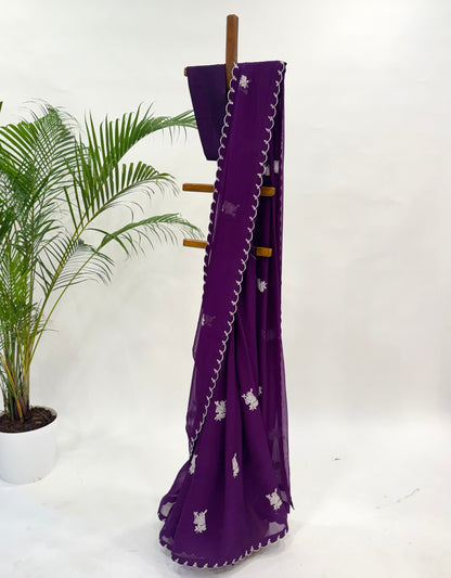 PURPLE FALLING ORGANZA SAREE WITH THREAD MOTIFS AND UNSTITCHED BLOUSE FABRIC