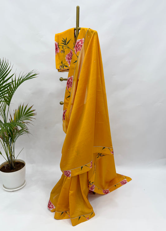 MUSTARD YELLOW PEONIA BORDER CHANDERI SILK SAREE AND FLORAL BLOUSE FABRIC