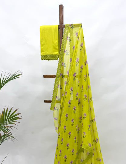 LIMEGREEN PEONIA MOTIFS GEORGETTE SAREE WITH CROCHET LACE AND SILK BLOUSE FABRIC