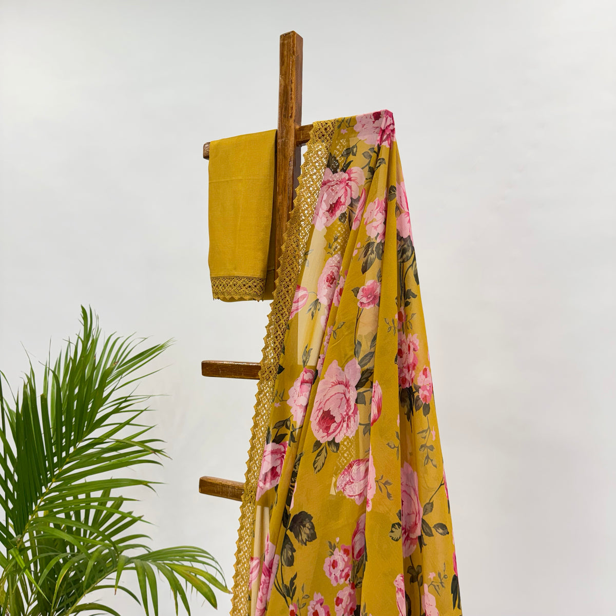 GREENISH YELLOW FLOWER BUNCH GEORGETTE SAREE WITH CROCHET LACE