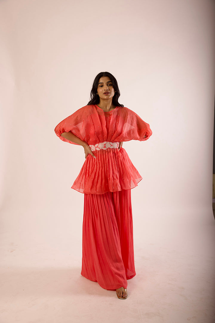 coral peplum pants