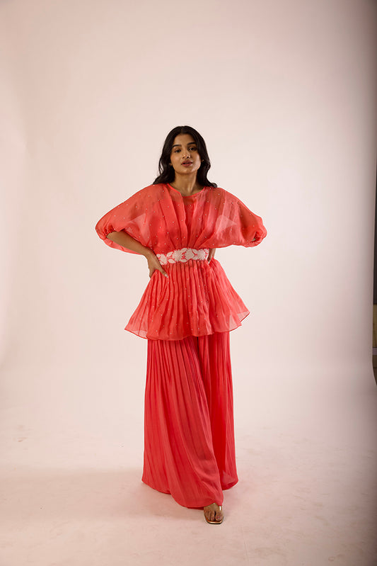 coral peplum pants