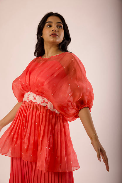 coral peplum pants