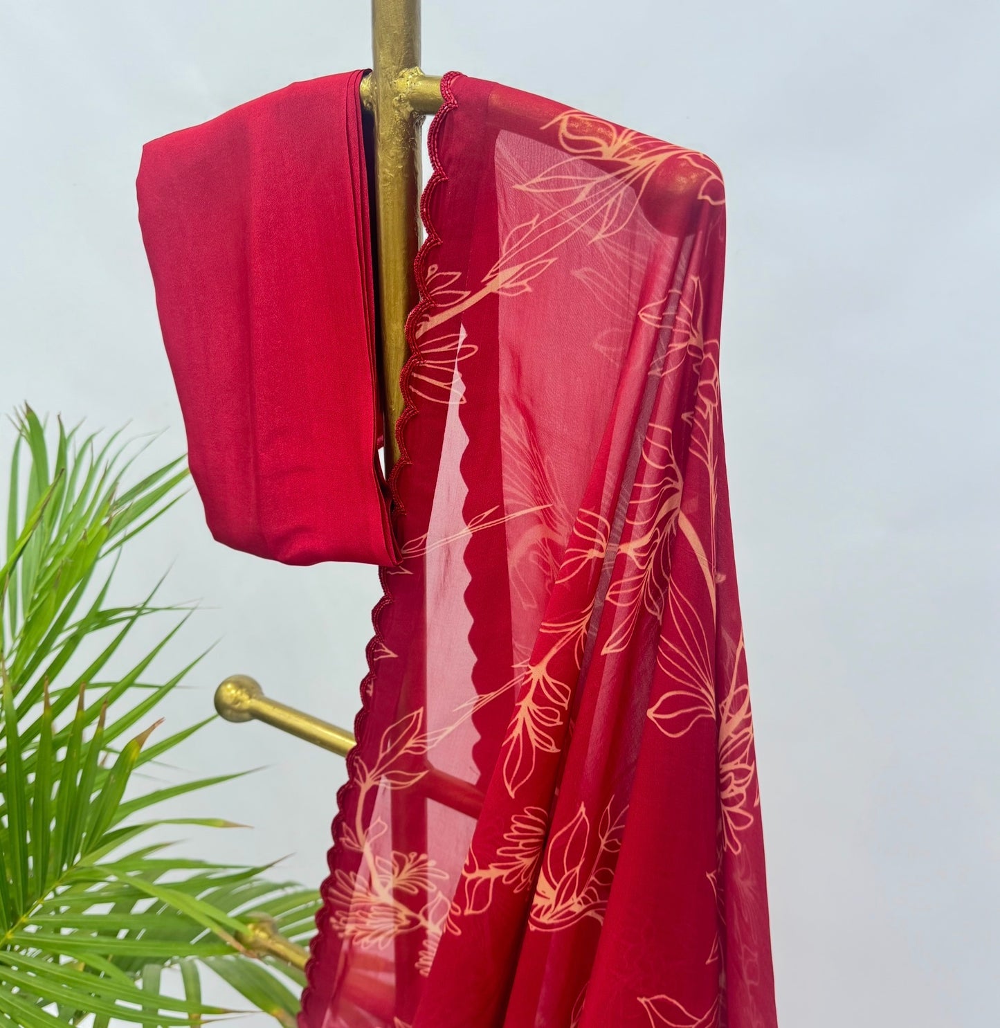 Red Foliole Outline Saree with cutbeads scalloo