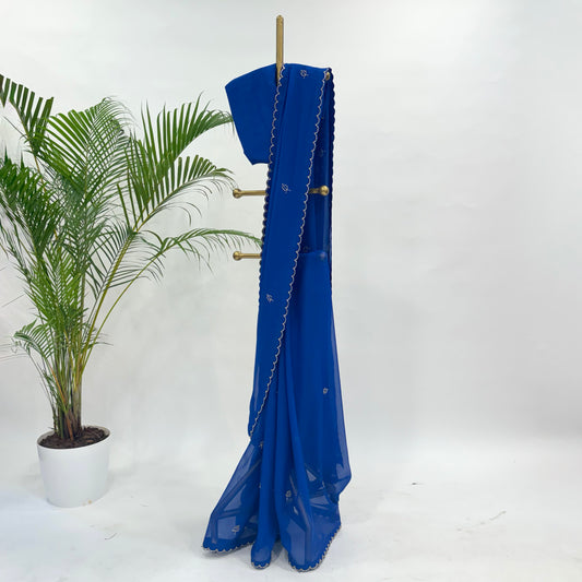 Shocking Blue Leaf Pearl Motifs Falling Organza Saree