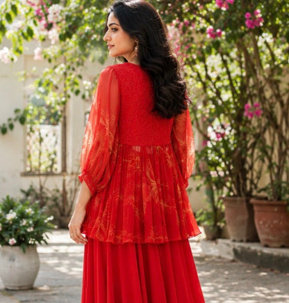 Red foliole peplum pants with applique embroidery