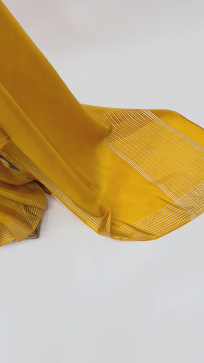YELLOW CREPE SILKS SAREE WITH PINK SINGLE FLOWER BUNCH BLOUSE FABRIC