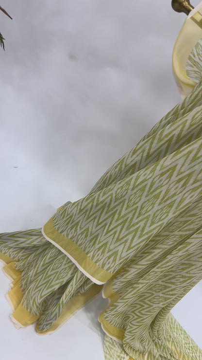 GREEN STRIPES GEORGETTE SAREE WITH YELLOW FLORAL BLOUSE FABRIC