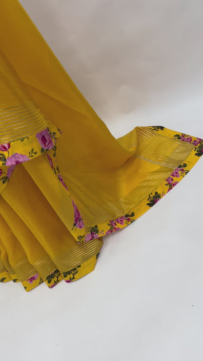 YELLOW FLOWER BUNCH SILK BORDER CREPE SILK SAREE